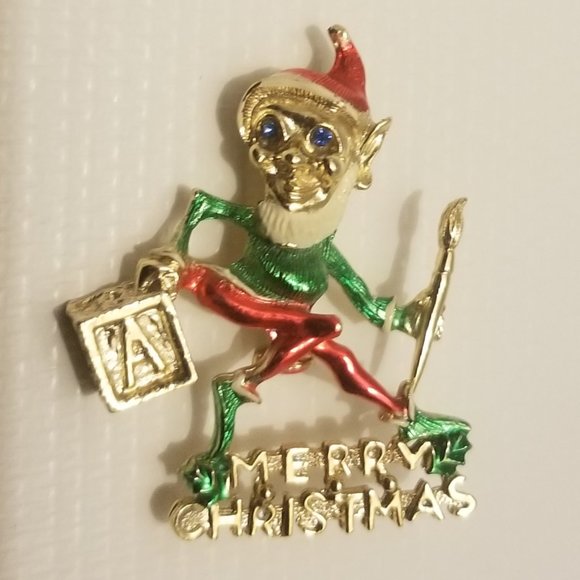 Jewelry - Elf pin, signed B.J., moving arm- great condition!